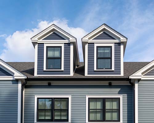 Storm damaged shingle with circled damage marks
